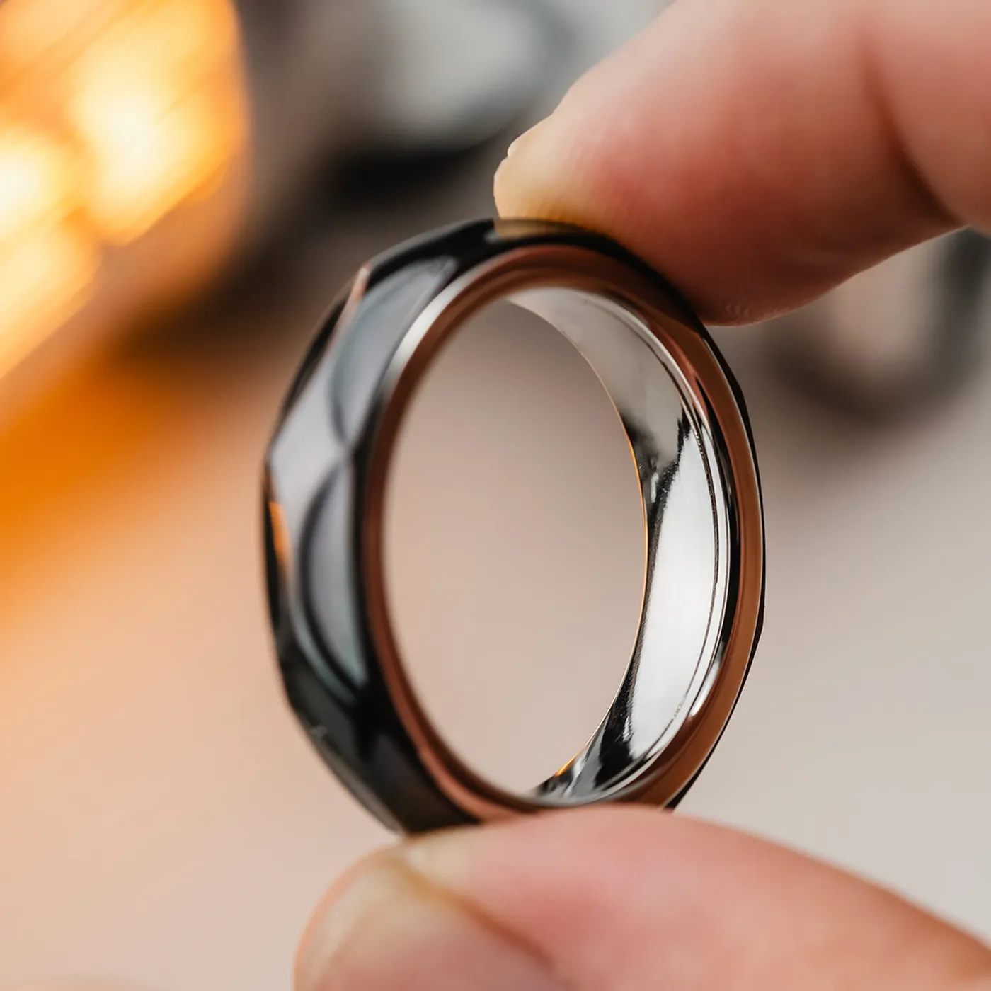 A ring held between finger and thumb — the kind of photo that counts as ownership proof